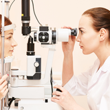 Ophthalmologist conducting an eye test 